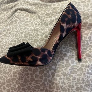 Cheetah heels. Never worn.
